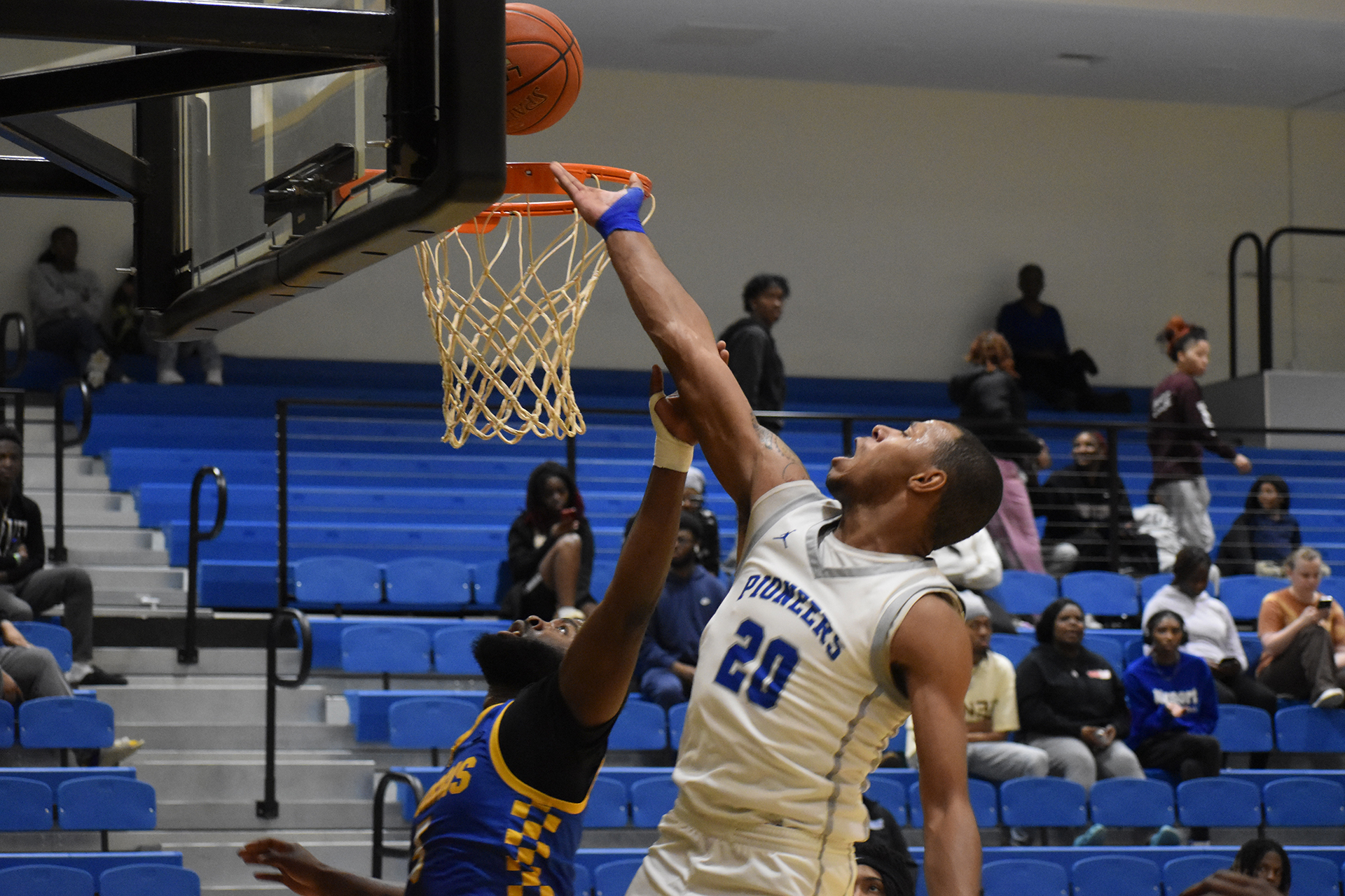 Tavarez Lacey had a double double - 12 points and 11 rebounds - in the 80-72 win over Morris College. Photo by Makinnley Smart.