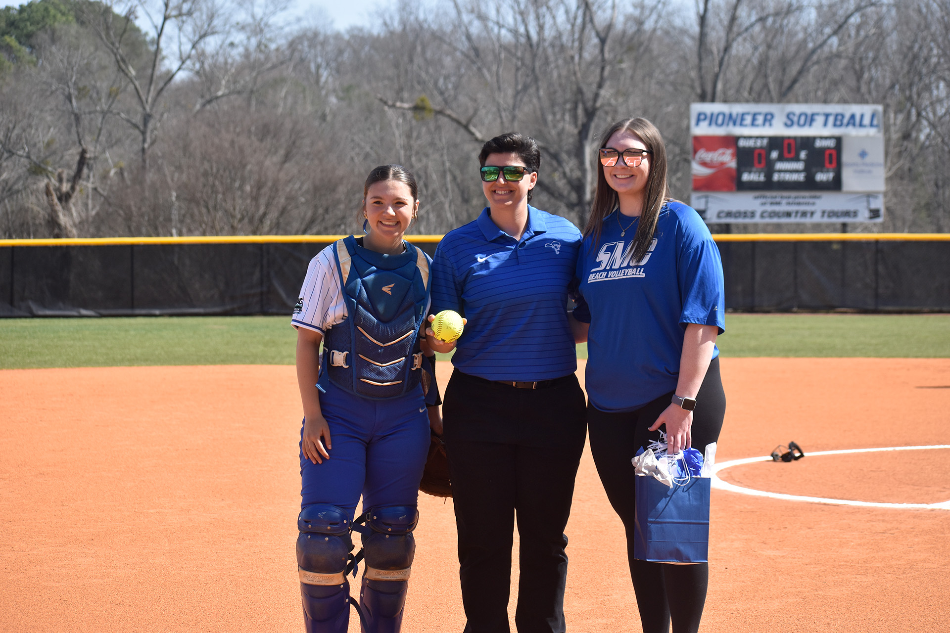 Brooke Palmer, former SMC softball standout and current Assistant Athletic Director for Facilities and Game Operations, threw out the first pitch // photo by Emer McAuliffe (SMC Sports Communications intern)